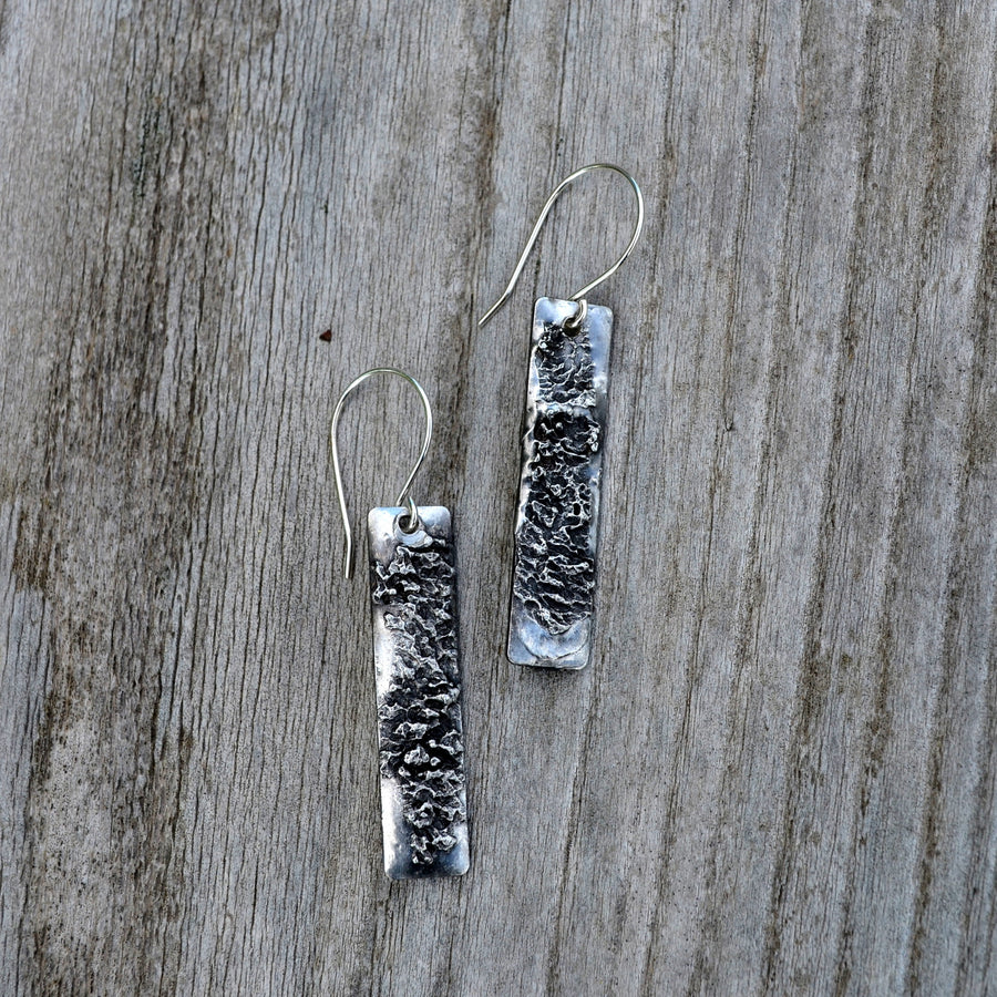 Rectangle tag earrings with Sterling Silver ear wires. Handmade in silver finish. Looks like a Skyscraper building.Truly Hand Made in USA by Louisiana Artisan at Bayou Glass Arts Studio. Chain is quality plated fully adjustable Figaro style. All are 100% handmade from metals that contain NO lead, cadmium, zinc or nickel.