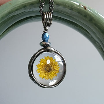 Handmade Dainty Yellow Wildflower Pendant Necklace. Truly hand made in USA by Louisiana artisan at Bayou Glass Arts studio.