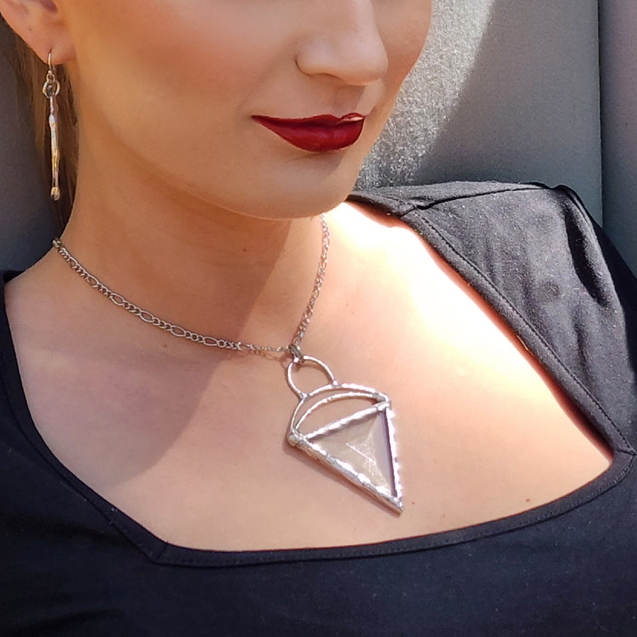 Handmade Bevel Stained Glass Pendant Necklace on model. Truly hand made in USA by Louisiana artisan at Bayou Glass Arts studio.