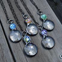 Assortment of 5 Handmade Prism Kaleidoscope Pendant Necklaces with opal insets of varying colors. Jewelry Created in USA 