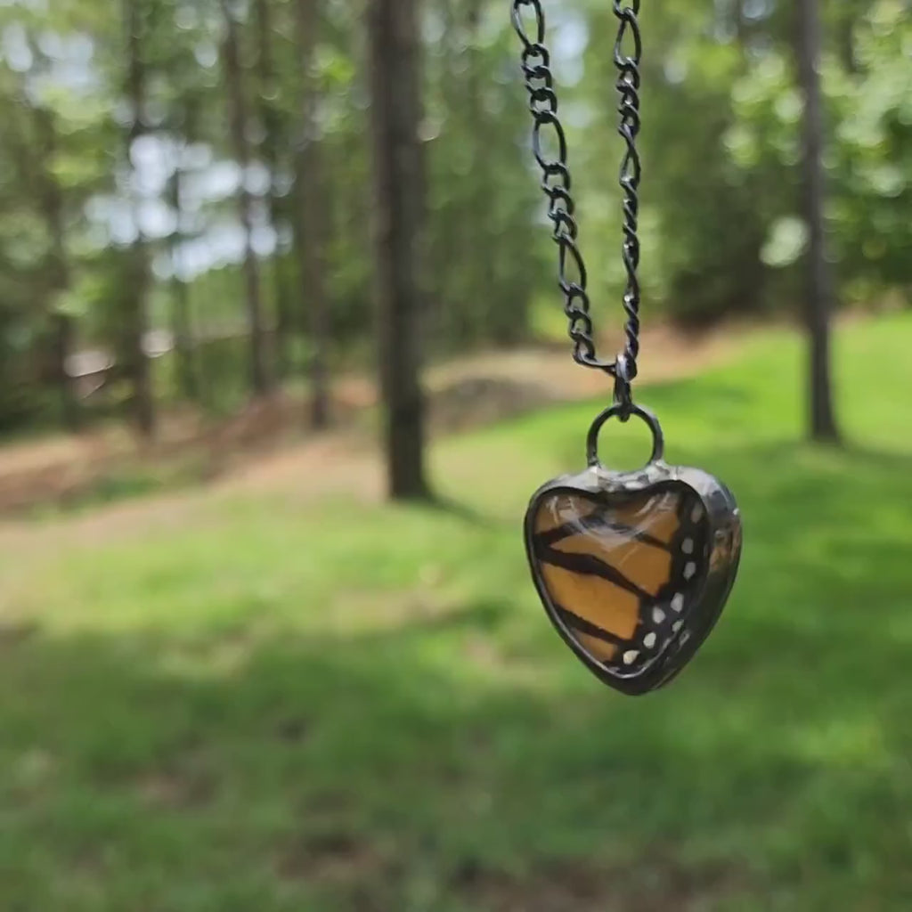 Video of Handmade Real Butterfly Wing Heart Necklace in Orange and Black