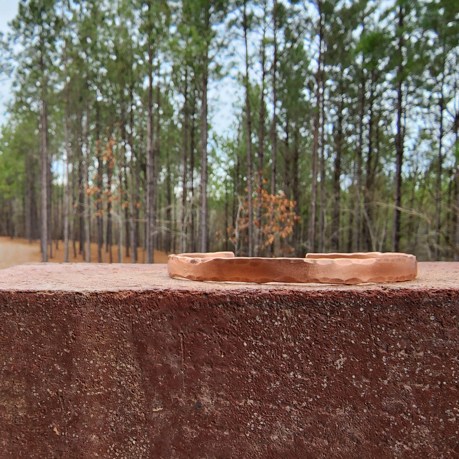  closeup of edge hand hammered copper cuff bracelet for men. Truly Hand Made in Louisiana USA.