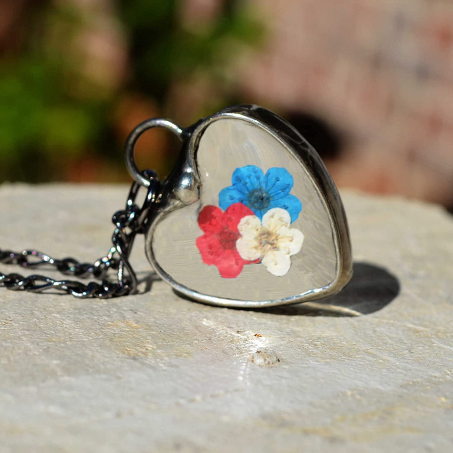 Handmade Red White and Blue Pressed Flower Heart Pendant Necklace. Truly Handmade in USA by Louisiana Artisan at Bayou Glass Arts Studio. Forget Me Nots