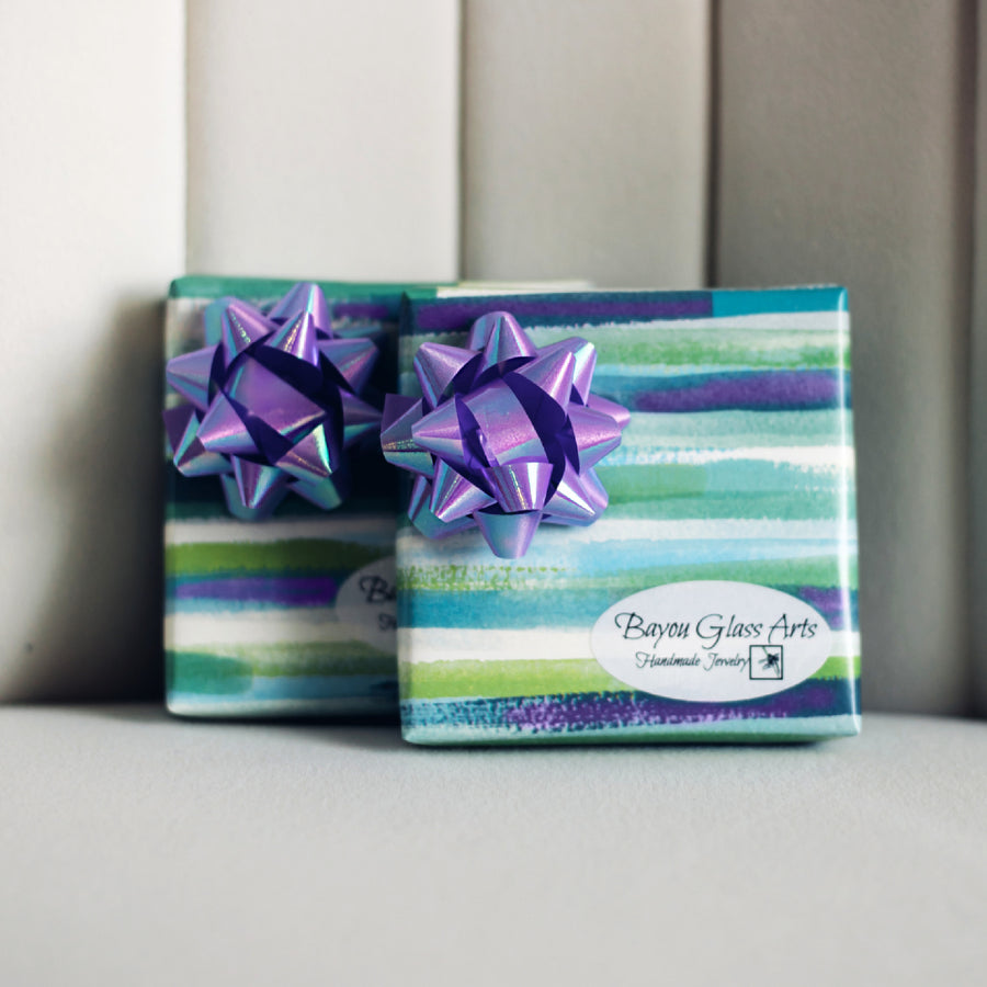 2 boxes Gift Wrapped by Bayou Glass Arts. Lavender and Green/Blue high quality wrapping paper with coordinated bow. Then wrapped in designer tissue paper before it goes in the shipping box. No charge to add a Gift message.