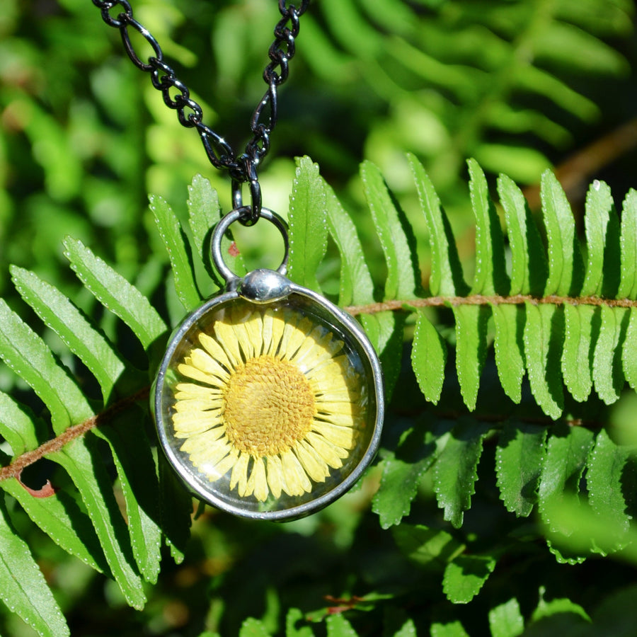 Yellow Aster Pressed Flower Necklace Handmade by Louisiana Artisans at Bayou Glass Arts. 