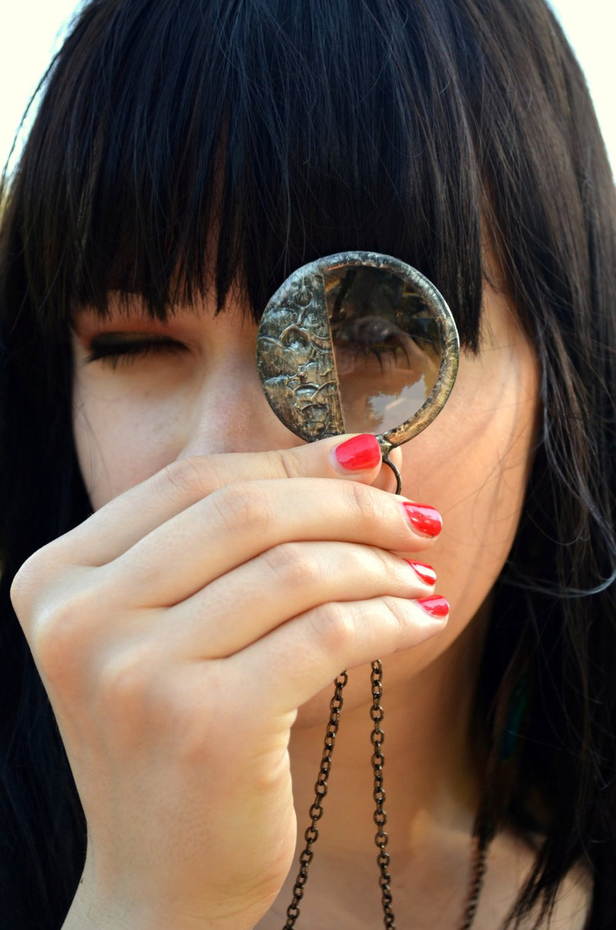 Model_looking_through_Steampunk_magnifier