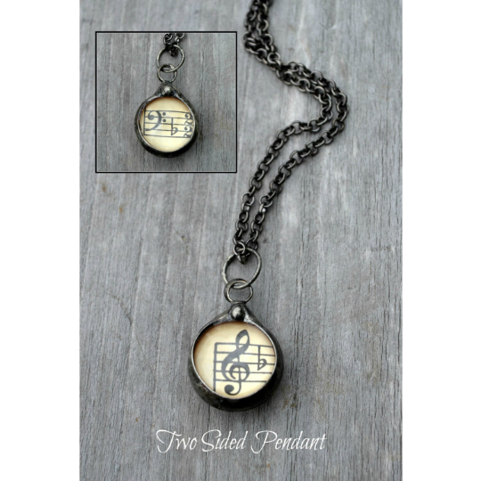 Musical Pendant Necklace - Made from Vintage Sheet Music under glass - Two Sided - Treble Clef on one side and Bass Clef on Reverse ( shown in the inset) - Hand Made in USA by Louisiana Artisan at Bayou Glass Arts studio.