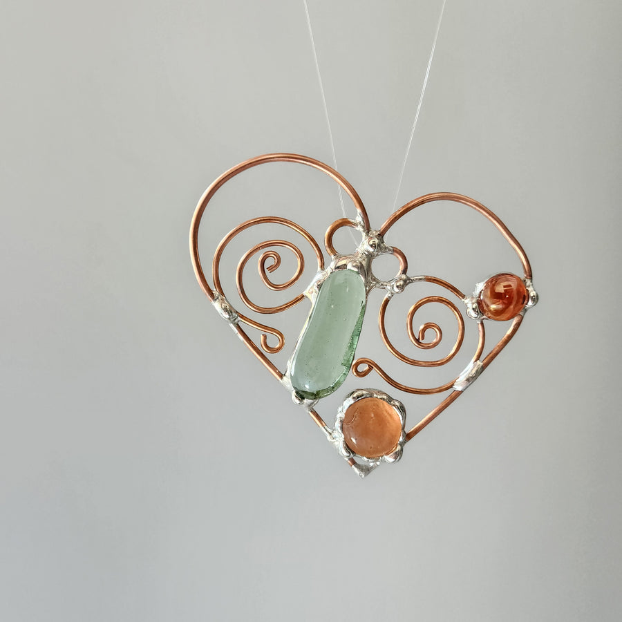 Heart sun catcher, home decor, kitchen window hanging. Heart shaped with real glass soldered with no lead by Louisiana Artisan at Bayou Glass Arts studio.