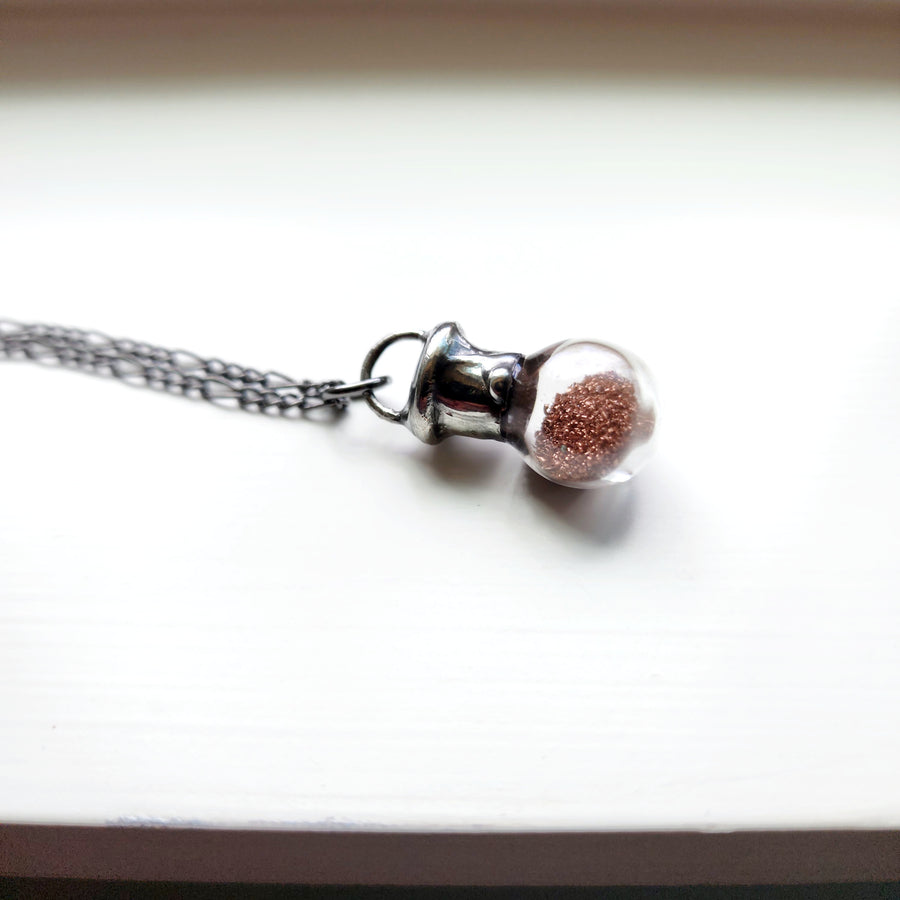 Glass Bottle Necklace filled with Copper Shavings