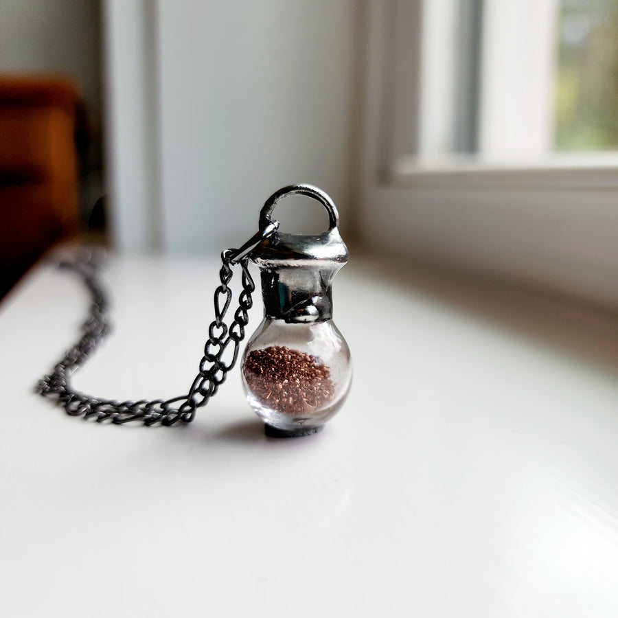 Glass Bottle Necklace filled with Copper Shavings