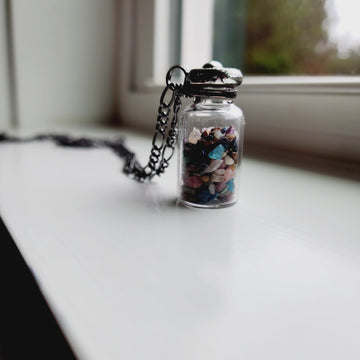 SOLD - Tiny Polished Gemstones in Vintage Glass Bottle Fidget Necklace
