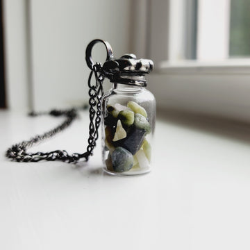 Vintage Glass Bottle with Green Gemstones