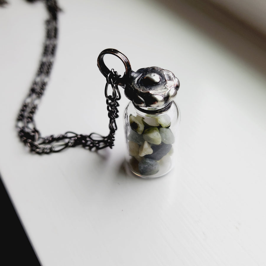 Vintage Glass Bottle with Green Gemstones