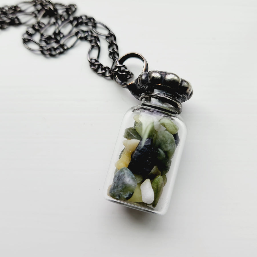 Vintage Glass Bottle with Green Gemstones