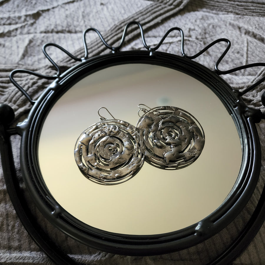 Handmade Silver Hoop Earrings. Heavy Statement Earrings. Truly hand made in USA by Louisiana artisan at Bayou Glass Arts studio.