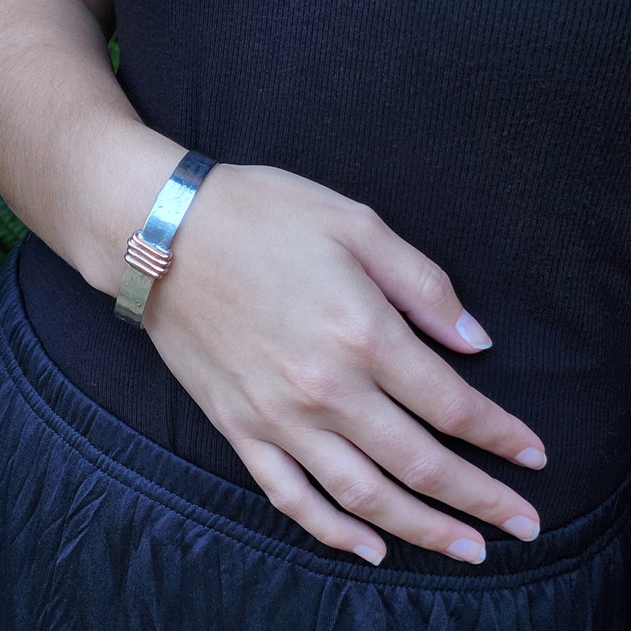  Mixed Metal Cuff Bracelet for Women, Silver tone cuff with copper wire wrap minimalist decoration. All Bayou Glass Arts Jewelry is hand made in USA with no lead, no cadmium, no nickel and no zinc.