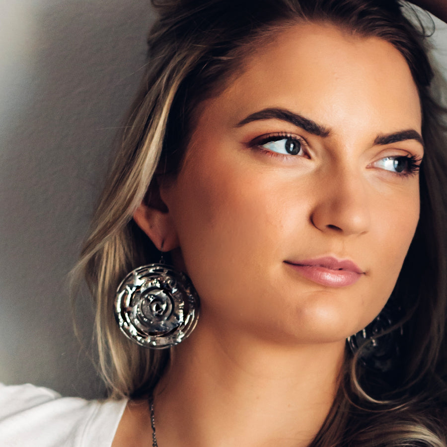 Handmade Silver Hoop Earrings. Heavy Statement Earrings. Truly hand made in USA by Louisiana artisan at Bayou Glass Arts studio.