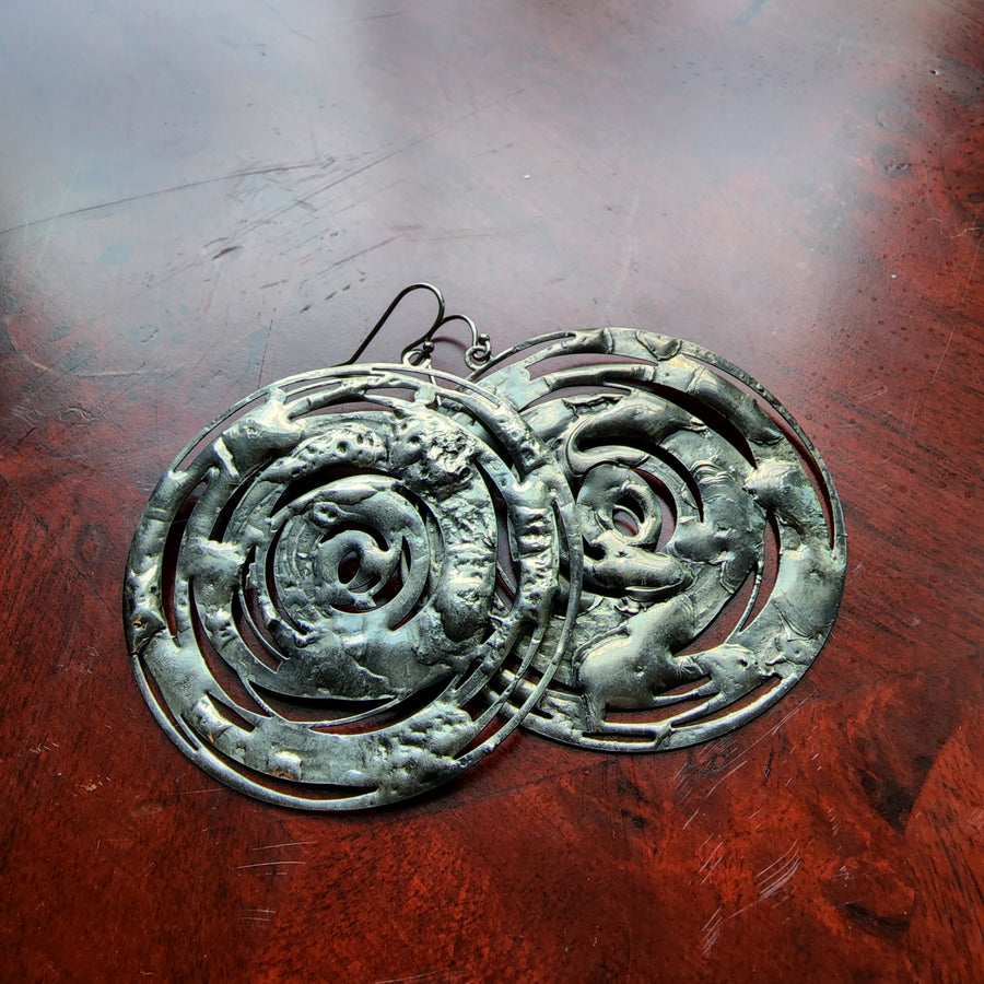 Handmade Silver Hoop Earrings. Heavy Statement Earrings. Truly hand made in USA by Louisiana artisan at Bayou Glass Arts studio.