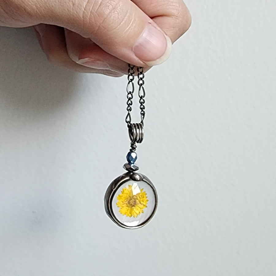 Handmade Dainty Yellow Wildflower Pendant Necklace. Truly hand made in USA by Louisiana artisan at Bayou Glass Arts studio.