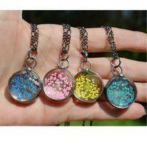 4 different colored queen annes lace pendants pink blue aqua and yellow