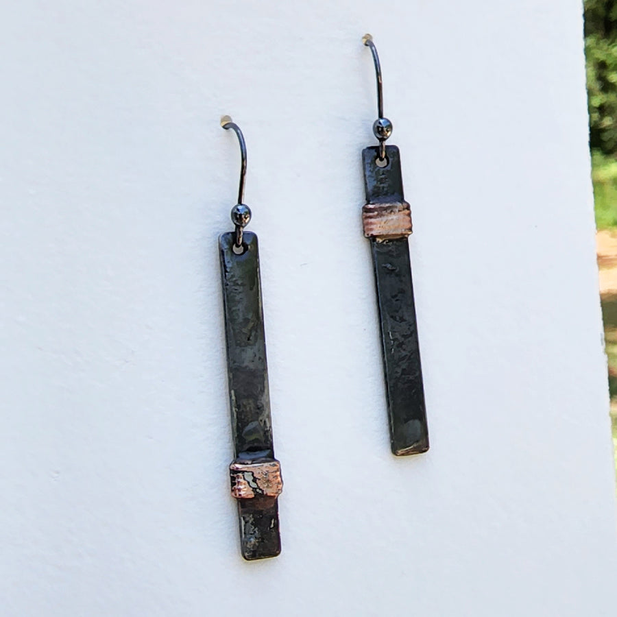 Mixed metal asymmetrical bar earrings, hand formed oxidized sterling silver ear wires, wire wrap in copper. Best for everyday wear. Truly hand made in USA by Louisiana Artisans at Bayou Glass Arts Studio.