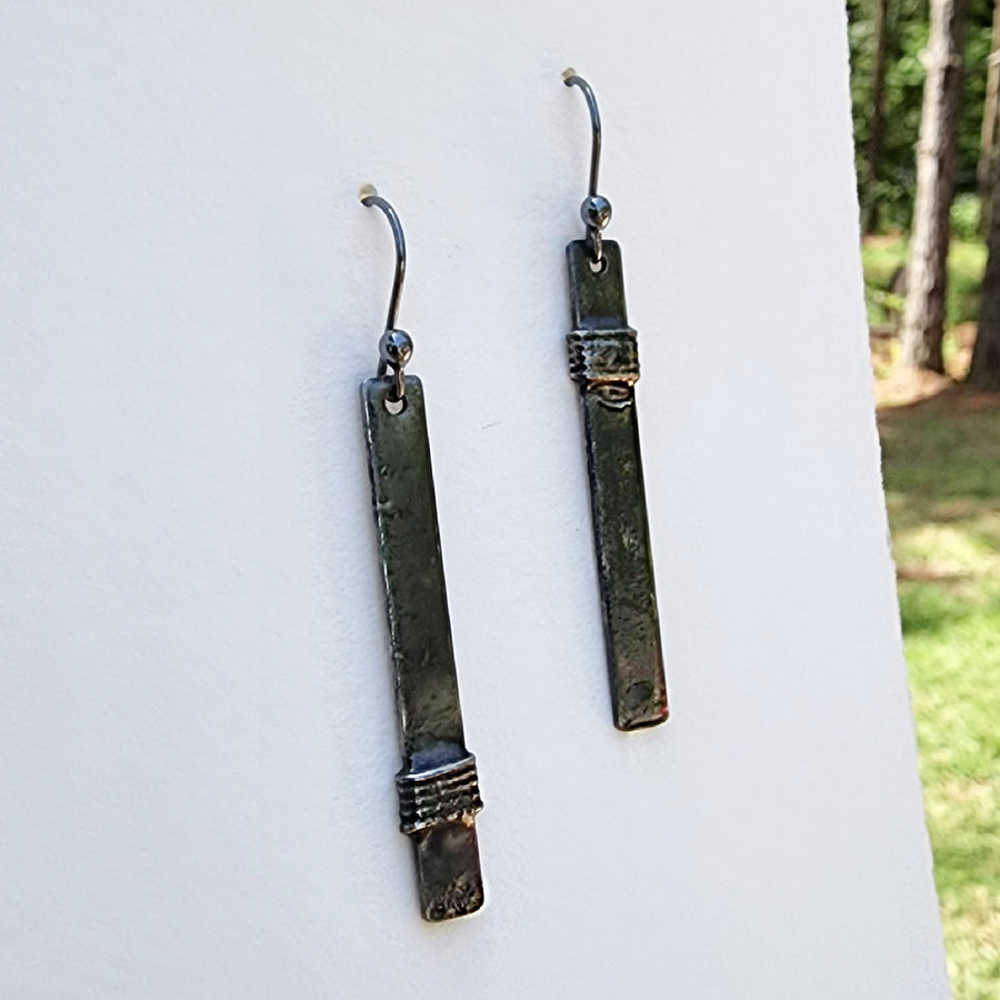Mixed metal asymmetrical bar earrings, hand formed oxidized sterling silver ear wires, Wire wrap in gunmetal. Best for everyday wear. Truly hand made in USA by Louisiana Artisans at Bayou Glass Arts Studio.