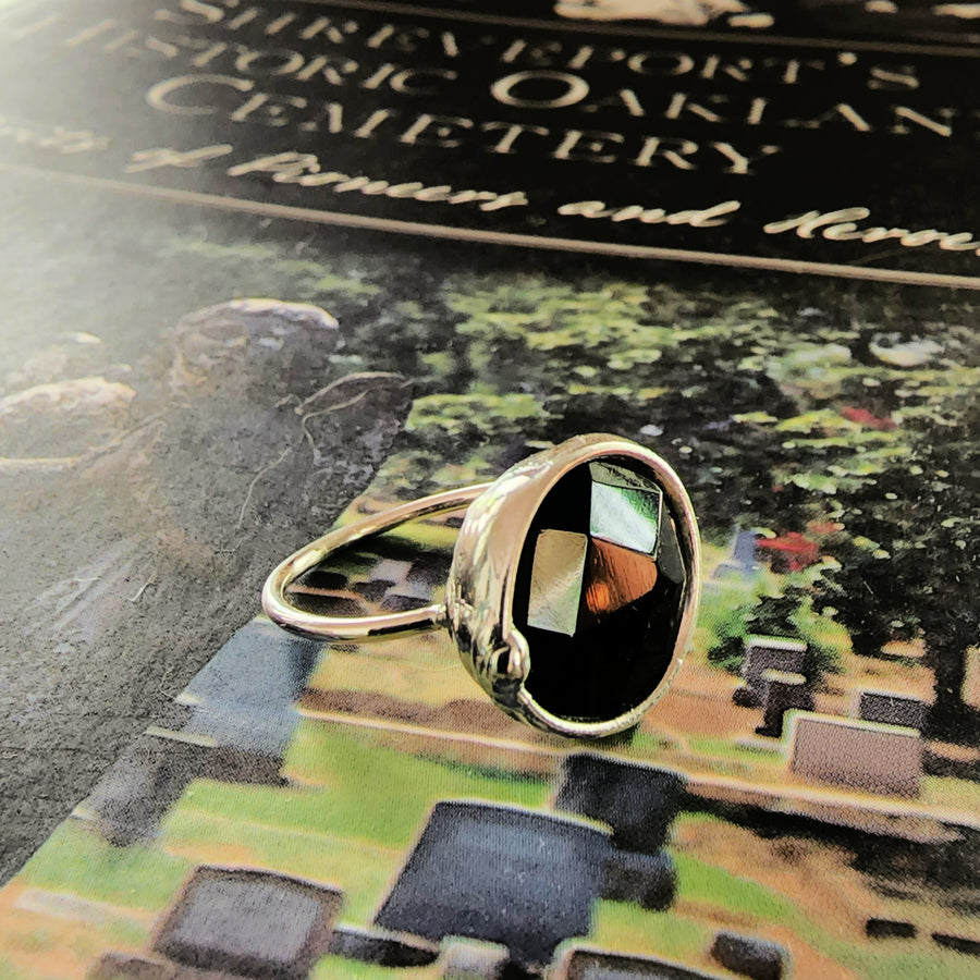 Hand Crafted Black Glass Faceted Ring on adjustable Sterling Silver Band. Hand made in USA by Louisiana Artisan at Bayou Glass Arts Studio.