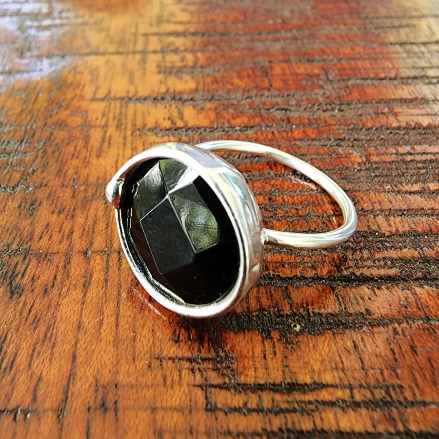 Hand Crafted Black Glass Faceted Ring on adjustable Sterling Silver Band. Hand made in USA by Louisiana Artisan at Bayou Glass Arts Studio.