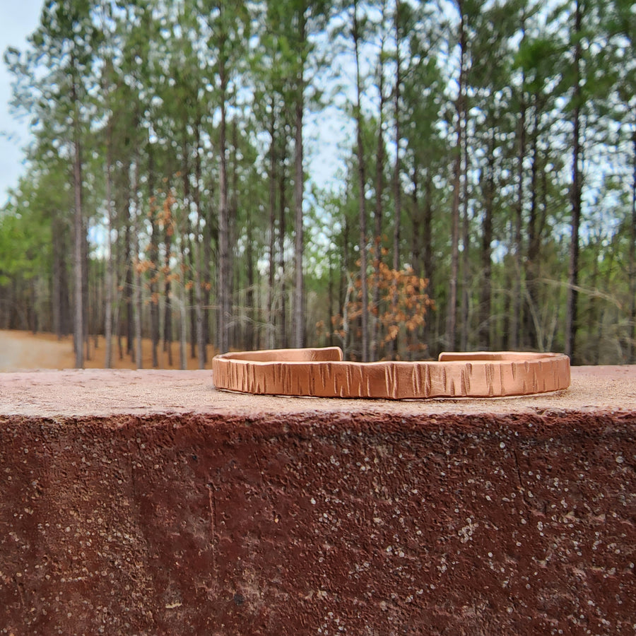  closeup of bark hand hammered copper cuff bracelet for men. Truly Hand Made in Louisiana USA.