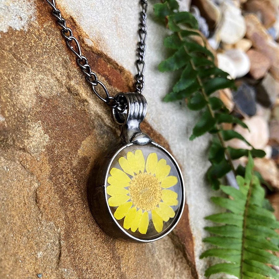 large yellow sunflower pendant dry pressed flower encased in glass necklace handmade by Louisiana Artisans at Bayou Glass Arts