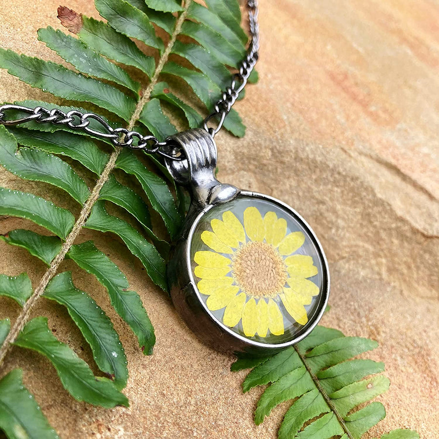 large yellow sunflower pendant dry pressed flower encased in glass necklace handmade by Louisiana Artisans at Bayou Glass Arts