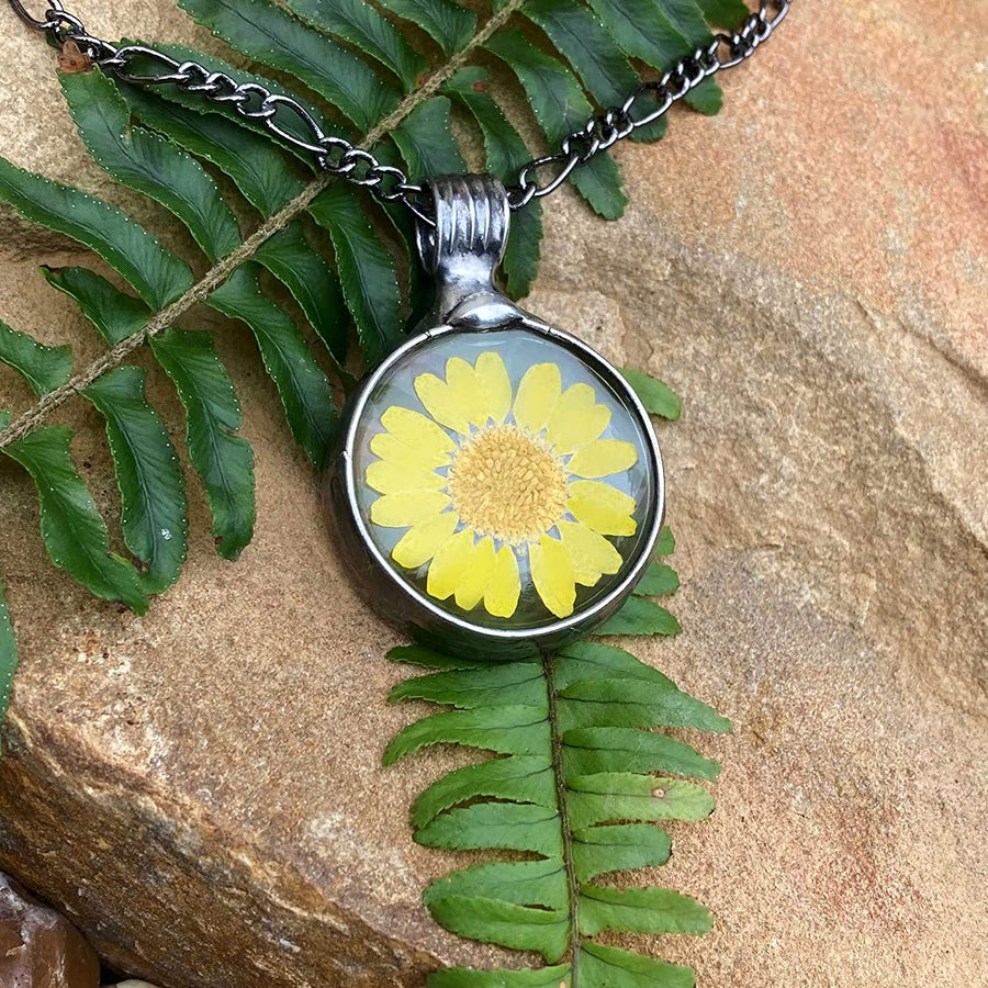 large yellow sunflower pendant dry pressed flower encased in glass necklace handmade by Louisiana Artisans at Bayou Glass Arts