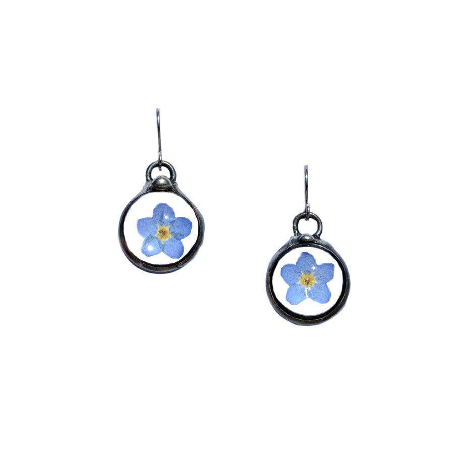 Handmade Real Dry Pressed Flower forget me not earrings, hand formed oxidized sterling silver ear wires. Truly Hand Made in USA by Louisiana Artisan at Bayou Glass Arts Studio.