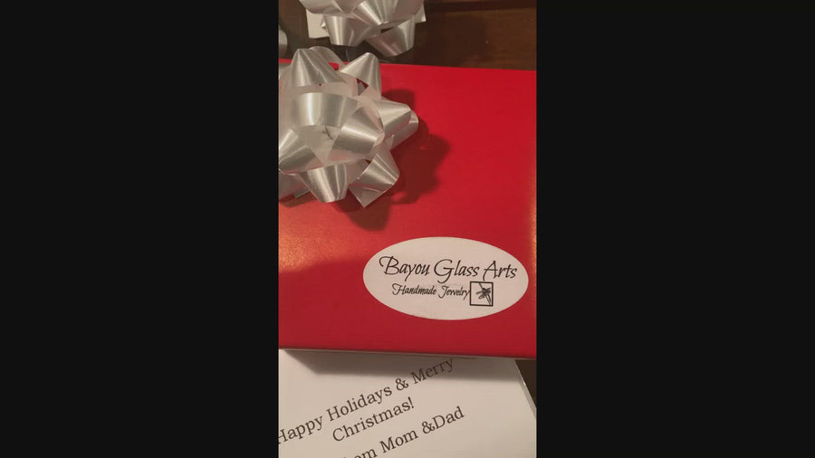 Christmas music plays while special gift wrap is applied to your purchase. 