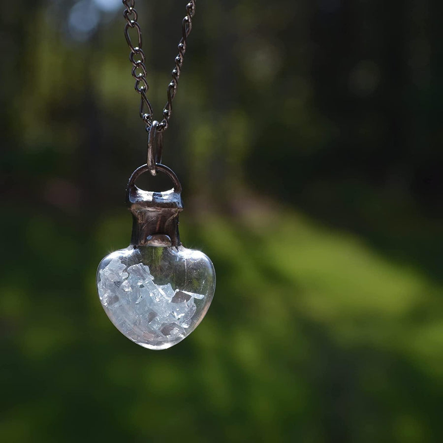 glass_shards_in_glass_heart_bottle_pendant