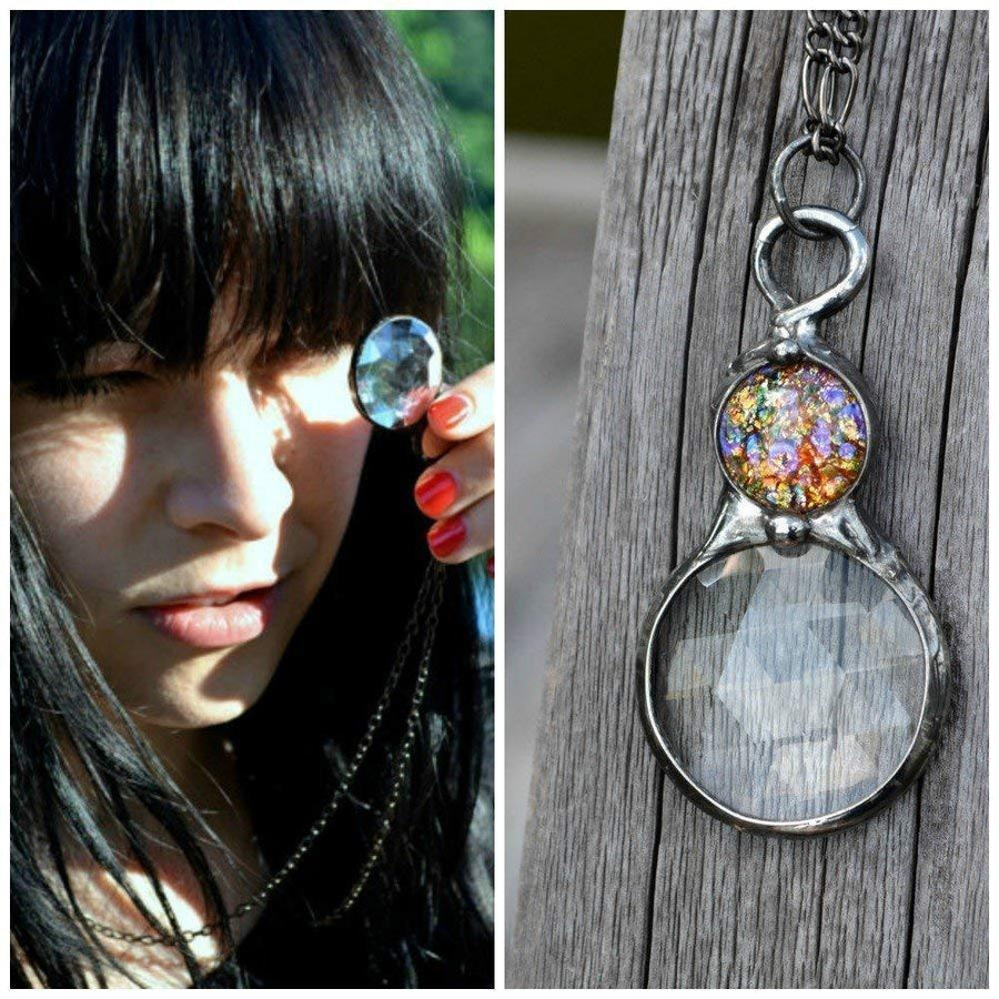 Model peeking through Handmade Kaleidoscope Pendant Necklace with multicolored opal inset. Jewelry Designed and Created in USA