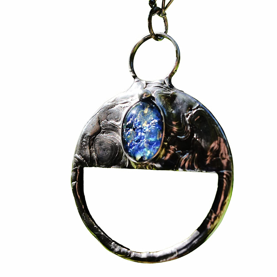 Magnifying glass pendant necklace with blue opal pendant