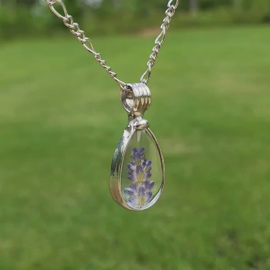 Real Dry Pressed Lavender Flowers Tear Shaped Pendant. Purple Flowers and Shiny Silver metal make this piece perfect for gift or self.