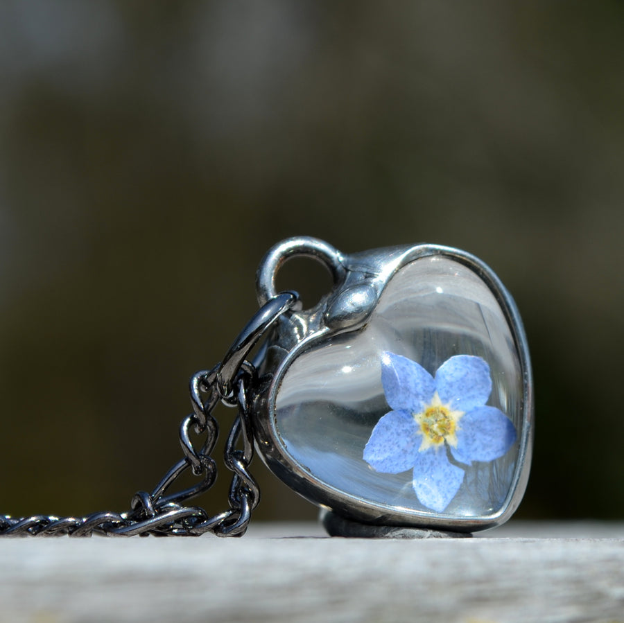 Dainty forget me not heart charm pendant necklace. Hand made at Bayou Glass Arts studio in Louisiana USA.