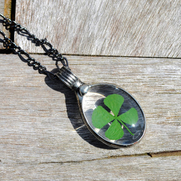 Oval Four Leafed Clover Pendant Necklace. Handmade in USA by Louisiana artisan at Bayou Glass Arts studio.