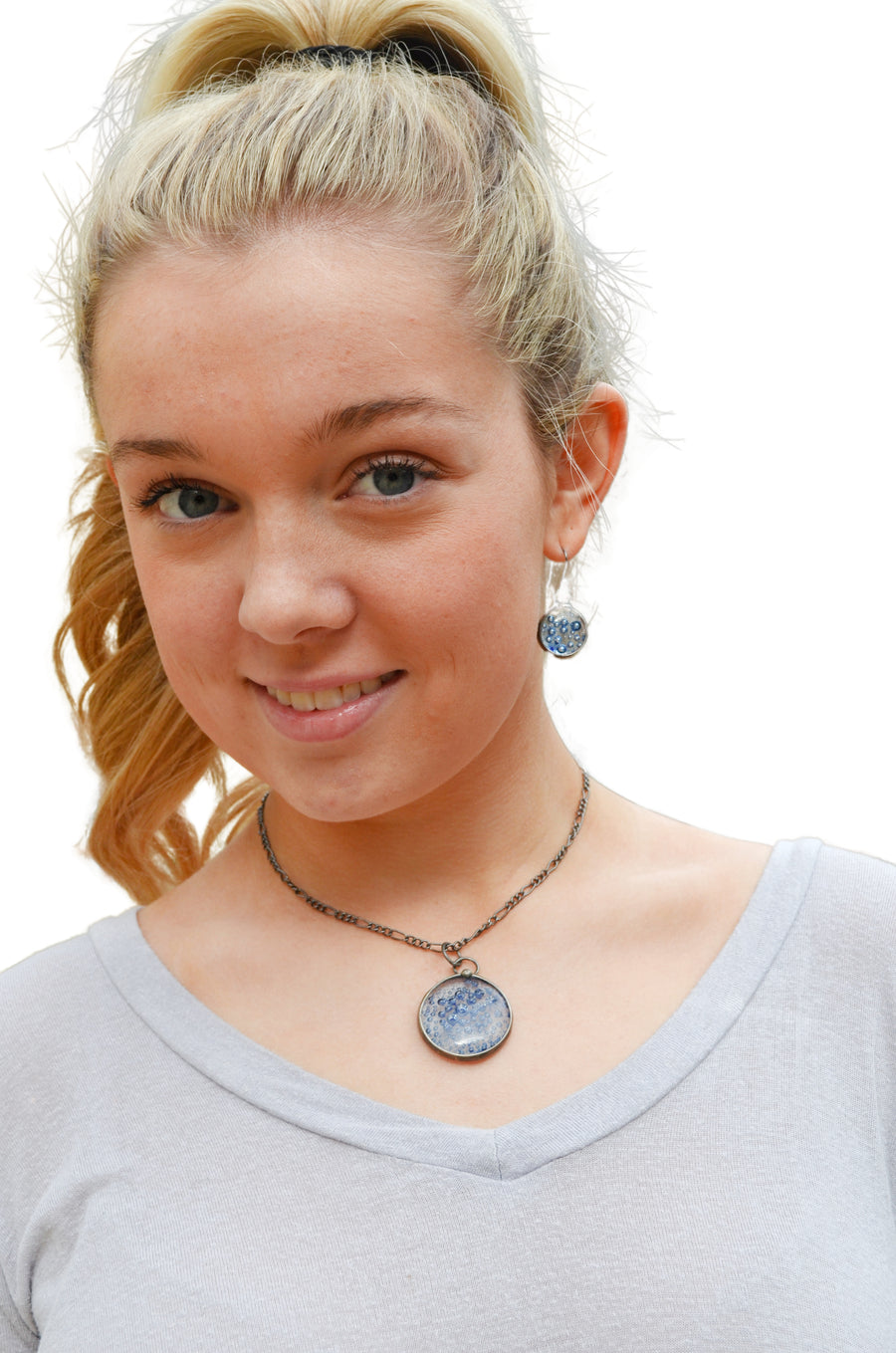 Model wearing both the Blue Bubble Dot Earrings and Pendant. Truly Handmade in USA by Louisiana Artisan at Bayou Glass Arts Studio.