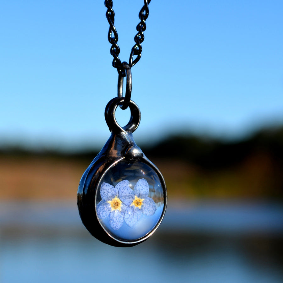  Handmade Real Dry Pressed Flower forget me not charm pendant necklace with 2 blooms inside. Truly Hand Made in USA by Louisiana Artisan at Bayou Glass Arts Studio.