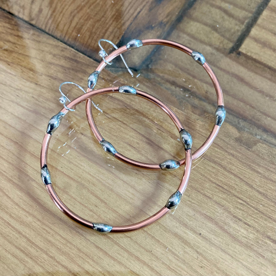 Large Copper Hoop earrings with silver on copper finish and Sterling Silver Ear Wires. Truly Hand Made in USA by Louisiana Artisan at Bayou Glass Arts Studio. 