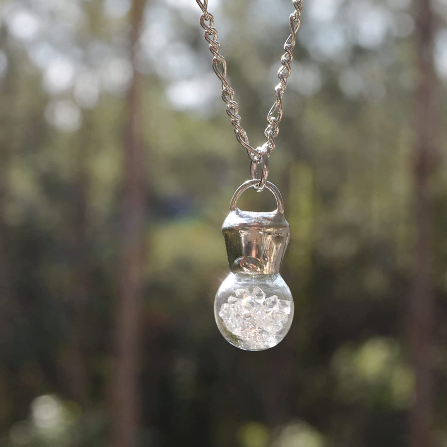 Hand Blown Glass Bottle Pendant filled with crystals in Shiny silver finish. Truly Hand Made in USA by Louisiana Artisans at Bayou Glass Arts Studio