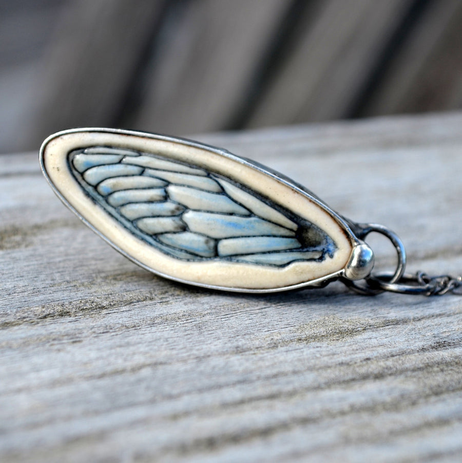 Porcelain impression of Cicada Wing made into a Bayou Glass Arts Pendant. Truly Hand Made in USA by Louisiana Artisan at Bayou Glass Arts. 