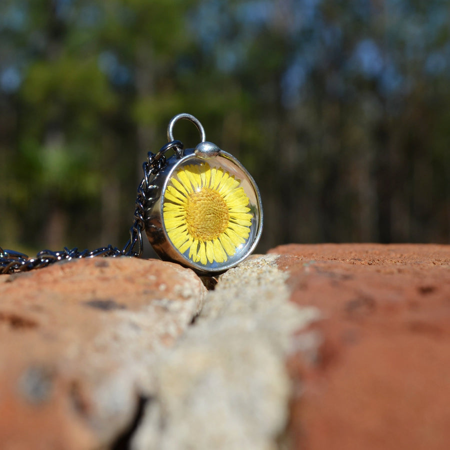 Yellow Aster Pressed Flower Necklace Handmade by Louisiana Artisans at Bayou Glass Arts. Sunflower dandelion aster sunshine