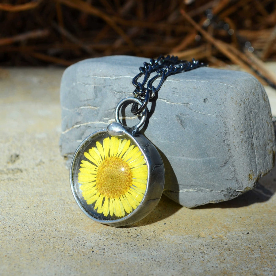 Yellow Aster Pressed Flower Necklace Handmade by Louisiana Artisans at Bayou Glass Arts. 