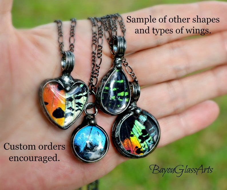 Assorted_Butterfly_Wing_Necklaces_designed_by_Louisiana_artisan_at_Bayou_Glass_Arts