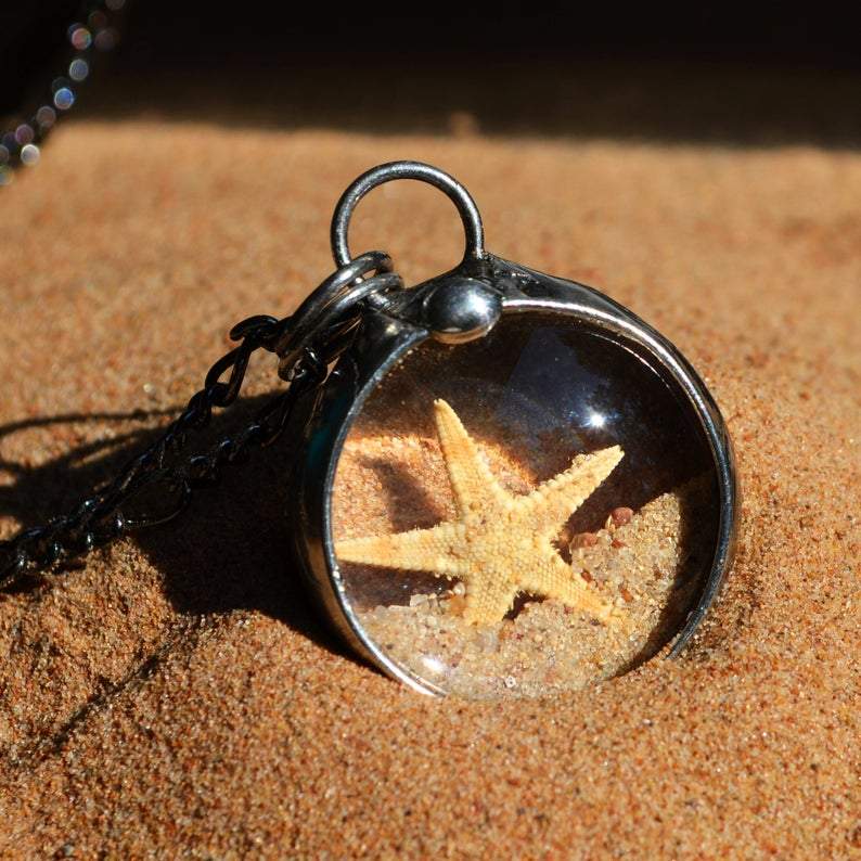 beach_shaker_pendant_with_sand_and_starfish_in_sand