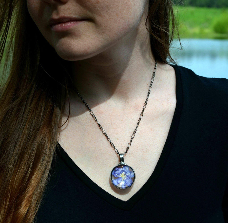 Pressed_Flower_Larkspur_Necklace_on_Model